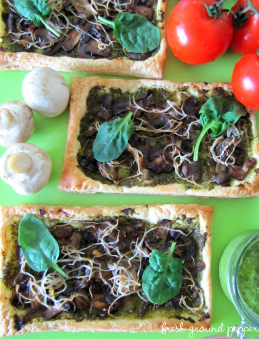 mushrooms & spinach pesto tart with bean sprouts from freshgroundpepperblog.wordpress.com
